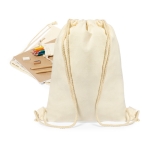 Saco de algodão com um conjunto de escrita, cores e caderno cor bege