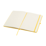 Caderno com bordas arredondadas e capa macia, folhas A5 pautadas cor amarelo segunda vista