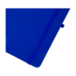 Caderno com bordas arredondadas e capa macia, folhas A5 pautadas cor azul real vista detalhe 1