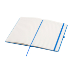 Caderno com bordas arredondadas e capa macia, folhas A5 pautadas cor azul-claro segunda vista