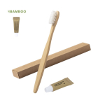 Escova de dentes de bambu e pasta dentífrica em caixa de cartão