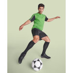 Conjunto desportivo unissexo com 2 t-shirts e calções 140 g/m2 Roly Direct Juve cor verde quarta vista de uso