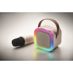 Conjunto de karaoke, colunas estilo vintage com luzes LED e microfone cor bege vista fotografia terceira vista