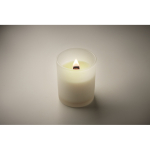 Vela de cera vegetal com aroma a baunilha e pavio de madeira cor branco vista fotografia terceira vista