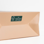 Saco papel premium com acabamento mate e asas de tecido resistente 7kg