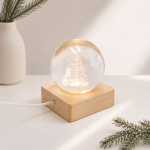 Decoração de Natal em bola de vidro com base de madeira e luz quente