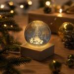 Decoração de Natal em bola de vidro com base de madeira e luz quente