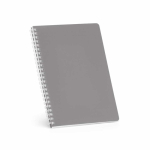 Caderno A5 com capa flexível e espiral lateral, páginas pautadas cor cinzento