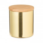 Vela com aroma a baunilha em frasco de metal com tampa de bambu cor dourado primeira vista