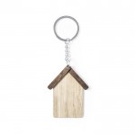 Porta-chaves em madeira com desenho de casa cor natural primeira vista de detalhe
