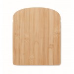 Tábua de cortar feita de bambu em forma de pão com ranhura na borda cor madeira quarta vista