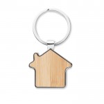 Porta-chaves merchandising com forma de casa cor madeira terceira vista