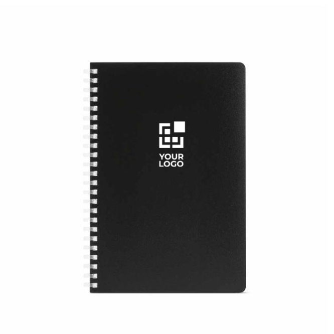 Caderno A5 com capa flexível e espiral lateral, páginas pautadas